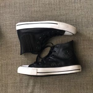 CONVERSE: black leather high tops